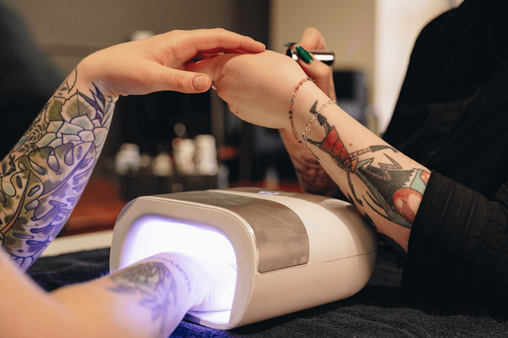 Gel Manicure at Velvet Files with hand in UV Light